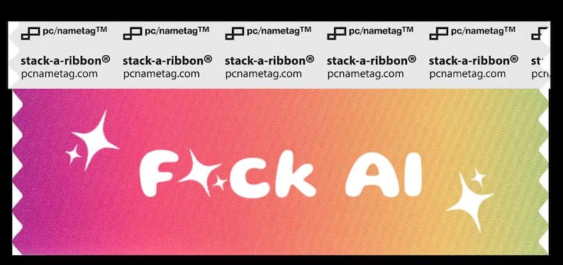 A rainbow gradient ribbon with sparkles graphic on both the left and right. The U is censored with sparkles. The white text says, “F*ck AI”