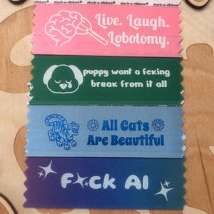 Badge Ribbons | Anti-Ai | All Cats Are Beautiful | Puppy Break | Lobotomy image 1