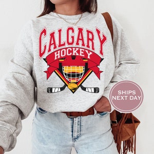 Calgary Flames Vintage NHL Crewneck Sweatshirt - VIPBAG TEE