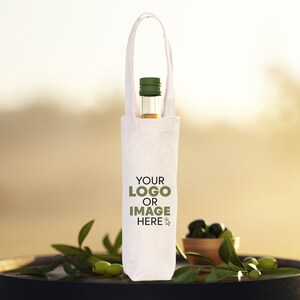 May include: White cotton wine bottle carrier with a green bottle inside. The carrier has a handle and the text "YOUR LOGO OR IMAGE HERE" printed on the front.