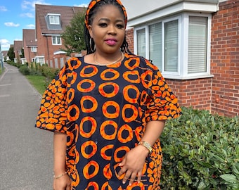 Ola African print blouse with headband.