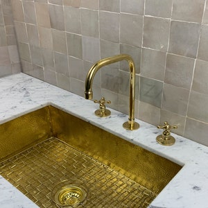 Unlacquered brass faucet , kitchen faucet , Three hole faucet , aged brass faucet , countertop faucet , sink faucet , sink , brass faucet