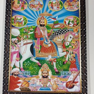 May include: A framed religious print featuring a central figure on horseback, surrounded by smaller illustrations. The main figure wears ornate clothing and a crown, holding a flag. The artwork has a vibrant color palette with a blue sky background and a decorative brown frame.