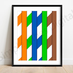 May include: A framed abstract art print with six vertical stripes of alternating colors: orange, green, blue, green, brown, and white. The stripes are diagonal, creating a striped pattern.