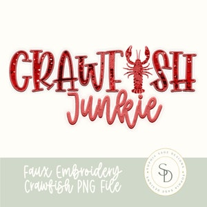 May include: Red faux embroidery design of the words "Crawfish Junkie" with a red crawfish illustration. The design is perfect for a t-shirt, tote bag, or other craft project.