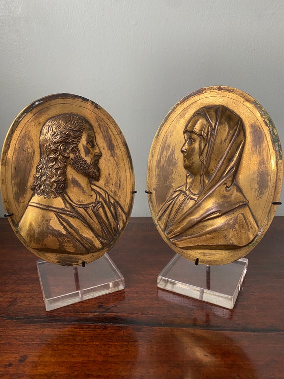 Very rare pair of antique gilt bronze oval plaquet