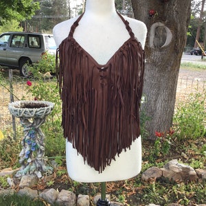 Top quality brown buckskin leather, buttery soft with fringe.