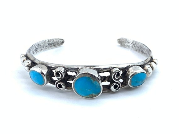 Incredible Swirl Vintage Native American Navajo Turquoise Snake Eyes Sterling Silver Bracelet Incredible Swirl Vintage Native American Navajo Turquoise Snake Eyes Sterling Silver Bracelet