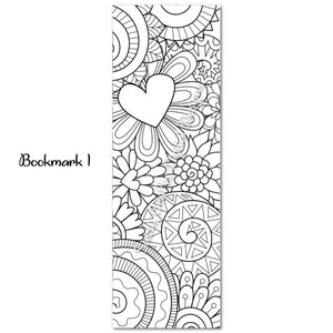 May include: Black and white bookmark featuring a heart and floral design. The bookmark is ready to be coloured in.