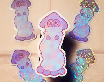 May include: Five iridescent holographic stickers of a cartoon purple and pink creature with large eyes and a rounded body. The stickers are on a pink background.