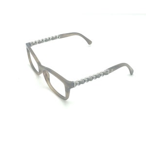 We Absolutely Need a Pair of Chanel Eyeglasses With a Chain - GARAGE