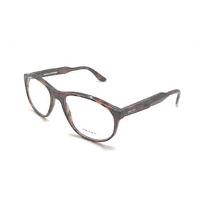 May include: Prada eyeglasses with a tortoiseshell pattern. The frames have an oval shape and the Prada logo is visible on the temples. The glasses are set against a white background.