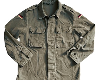 AG by EXPERIMENT MILITARY CHESTER JKT 美品 300125-7609.jpg?v=1738265088