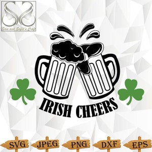 May include: Black and white illustration of two beer mugs clinking together with foam spilling out. The mugs are outlined in black and have a white interior. The text "Irish Cheers" is below the mugs. Two green shamrocks are on either side of the text.