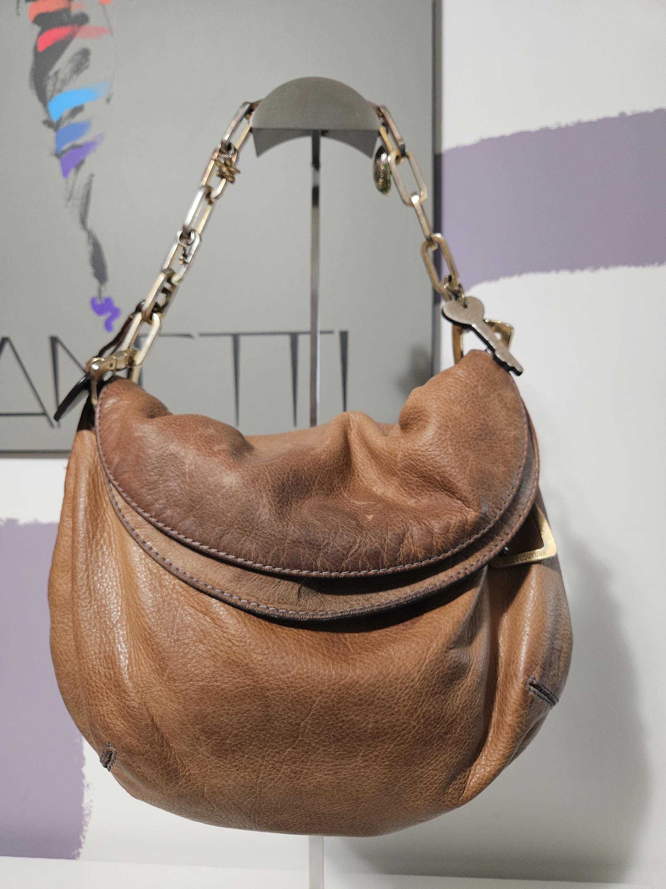 y2k 2000s juicy couture brown leather faux fur tassel charm shoulder bag Vintage Juicy Couture Brown Velour Shoulder Bag with Crest  main image 4
