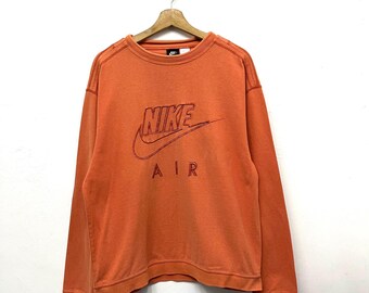 nike air sweatshirt orange