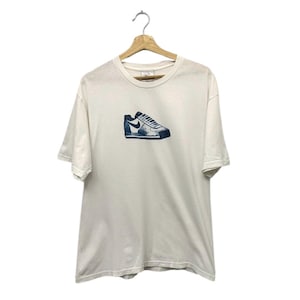 white tees and nike cortez