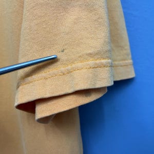 May include: A set of three ceramic mugs with a speckled, matte finish. The mugs are in shades of cream, light gray, and dark gray. Each mug has a simple, minimalist design, perfect for coffee or tea.