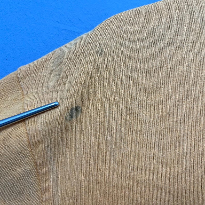 May include: A set of three ceramic mugs with a speckled, matte finish. The mugs are in shades of cream, light gray, and dark gray. Each mug has a simple, minimalist design, perfect for coffee or tea.