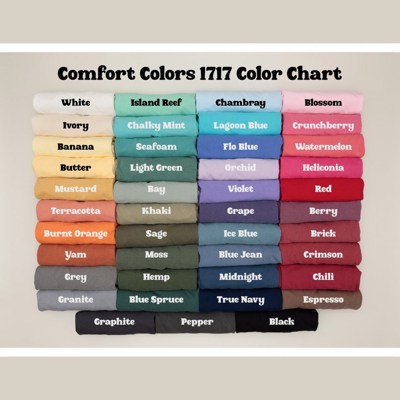 May include: A colour chart displaying 36 different shades of Comfort Colors 1717 fabric. The colours are arranged in rows of four, with each row representing a different colour family. The colour families are: White, Island Reef, Chambray, Blossom, Ivory, Chalky Mint, Lagoon Blue, Crunchberry, Banana, Seafoam, Flo Blue, Watermelon, Butter, Light Green, Orchid, Heliconia, Mustard, Bay, Violet, Red, Terracotta, Khaki, Grape, Berry, Burnt Orange, Sage, Ice Blue, Brick, Yam, Moss, Blue Jean, Crimson, Grey, Hemp, Midnight, Chili, Granite, Blue Spruce, True Navy, Espresso, Graphite, Pepper, Black.