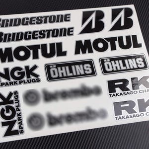 Adesivi per carenatura di motociclette, caschi e grafiche per moto, sponsor metallici premium, decalcomanie per Yamaha, Honda, Suzuki e Kawasaki, laminati