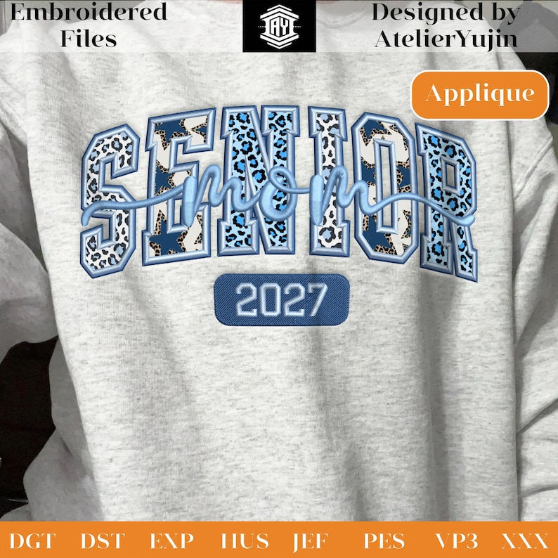 May include: A light gray sweatshirt with the words "SENIOR mom 2027" embroidered in blue and leopard print. The design includes the text "Embroidered Files" and "Designed by AtelierYujin". The word "Applique" is also visible.