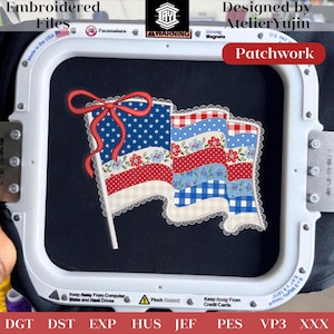 May include: Embroidered flag design with red, white, and blue patchwork. The flag features stars, stripes, and floral patterns, with a red bow at the top. The design is set within an embroidery hoop, with text that reads "Patchwork".