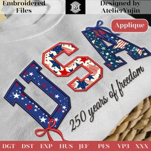 Op de afbeelding: Geborduurd ontwerp met de letters "USA" in rode, witte en blauwe ster- en streepmotieven, met de tekst "250 years of freedom". Het ontwerp is gelabeld met "Applique" en "Embroidered Files".