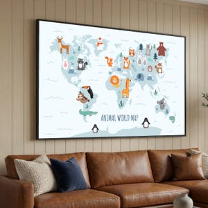 May include: A rectangular wall art print titled ANIMAL WORLD MAP featuring a light blue world map background with various cartoon animals placed across the continents, including a deer, raccoon, lion, giraffe, and penguin, framed in black.