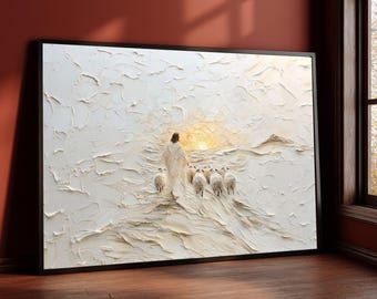 Könnte beinhalten: Strukturiertes weißes und beiges Kunstwerk in einem schwarzen Rahmen. Das Gemälde zeigt eine Figur in einem weißen Gewand, die eine Schafherde zu einem hellen, goldenen Licht führt. Das Kunstwerk wird auf einem Holzboden vor einer roten Wand ausgestellt.