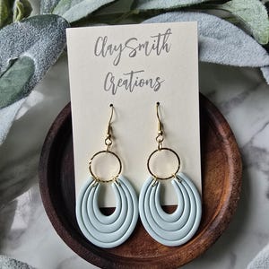 CLAY EARRINGS. Handmade polymer clay earrings. ClaySmith Creations.