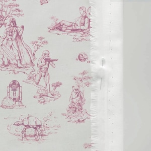May include: White fabric with a repeating pattern of Star Wars characters in a toile de Jouy style. The design features Darth Vader, Stormtroopers, and other characters in a pink hue.