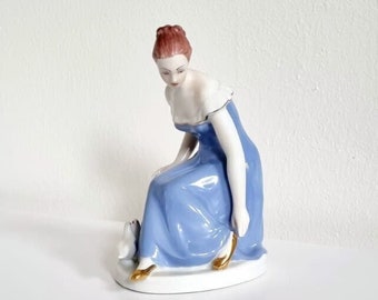 Cinderella by Royal Dux porcelain, gilded ball shoe and two doves