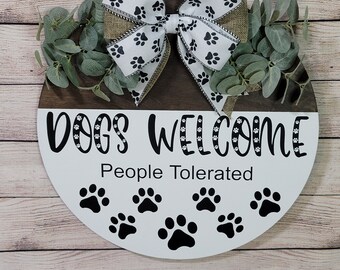 Dogs Welcome People Tolerated Door Hanger with Paw Prints