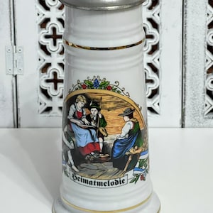 Vintage porcelain beer mug with pewter lid collector&#39;s beer mug.
