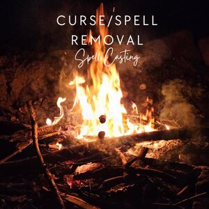 May include: A bonfire at night with the text "CURSE/SPELL REMOVAL Spell Casting" in white. The flames are bright orange and yellow, with smoke rising into the dark background. The fire is built on a bed of wood.