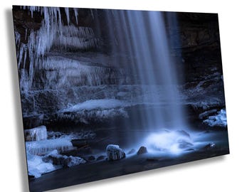 Icy Cucumber Falls in midwinter: Ohiopyle State Park in mysterious chilly blue shades. Dramatic waterfall image perfect over the bath