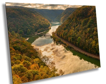 Hawks Nest State Park and calm New River from overlook at sunset. Almost Heaven landscape in West Virginia. New River Gorge Fayette
