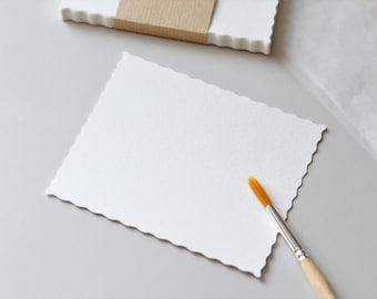 Blank postcards made of watercolor paper with wavy edges to design yourself