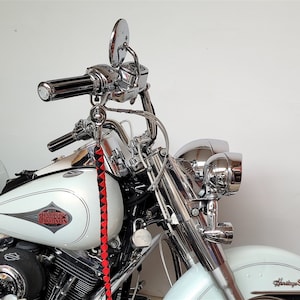 Motorcycle outlet whip purpose