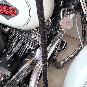 Handmade black leather whips