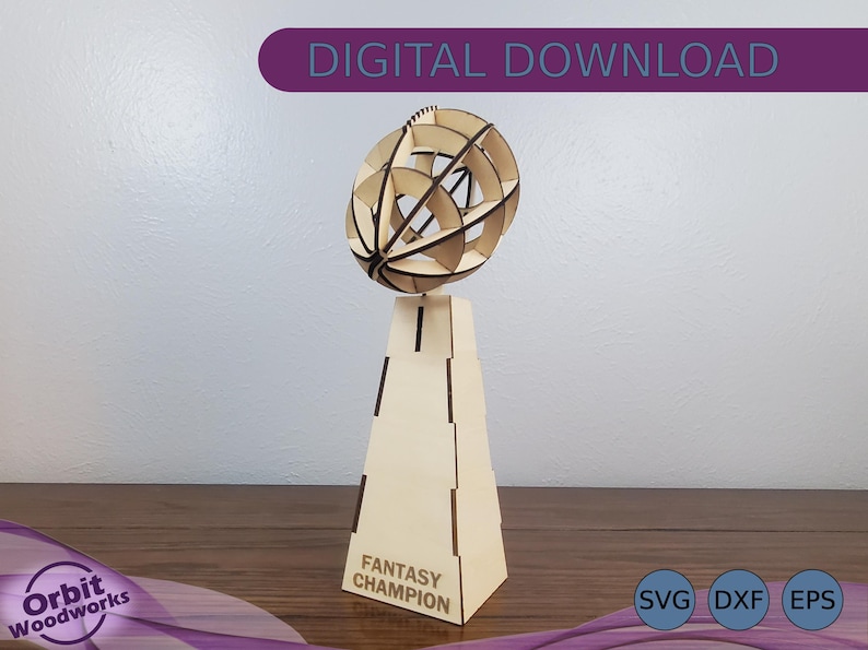 May include: A wooden trophy with a geometric sphere on top. The base of the trophy is a rectangular prism with the words "Fantasy Champion" inscribed on the front. The trophy is made of light brown wood and has a natural finish.