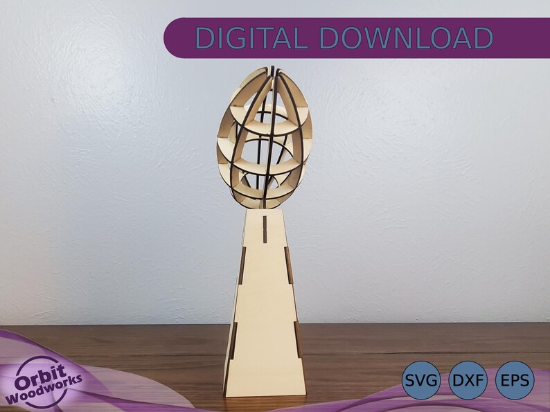 May include: A wooden model of a globe on a stand. The globe is made of multiple layers of wood, creating a 3D effect. The stand is a simple, rectangular shape. The model is a digital download, available in SVG, DXF, and EPS formats.
