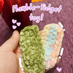 The ''marble-thing'' fidget toy.