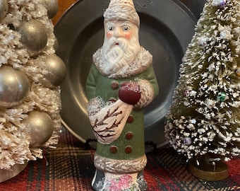 Good Tidings. Chalkware Santa Claus