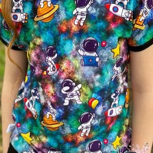 Astronauta de la Galaxia. Motivo digital, papel, sublimación.