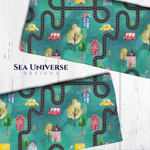 May include: A seamless pattern featuring a whimsical town with houses, trees, cars, and winding roads. The design is rendered in watercolor on a teal background.