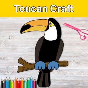 May include: A toucan craft template with a black and white toucan with a yellow and orange beak, sitting on a brown branch. The toucan has blue feet. The image includes a pair of pink scissors and a row of colored pencils.
