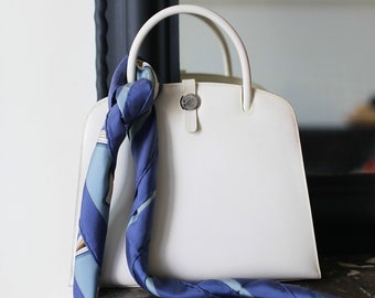 Hermès Dalvy model handbag in white grained leather