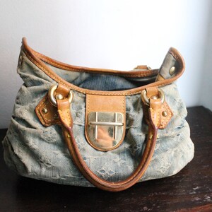 Louis Vuitton Pleaty handbag in blue denim and leather image 11